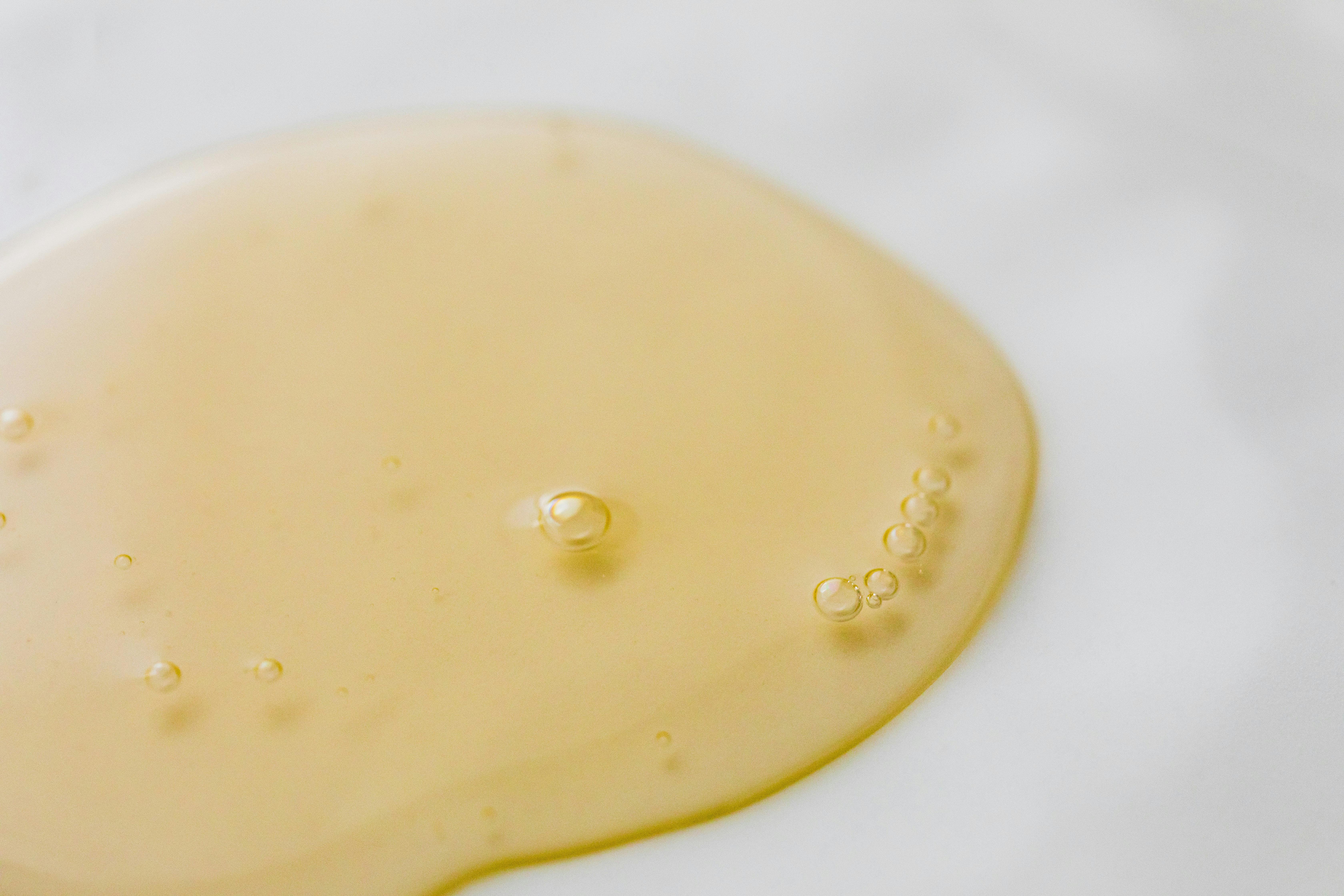 A stock photo of essential oil diffuser on a clean office desk in a professional setting